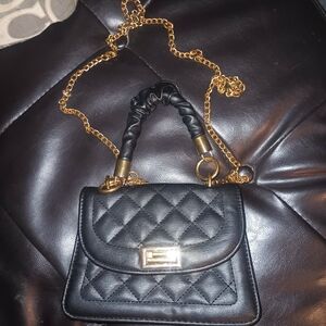 Elegant Black Quilted Handbag with Gold Chain